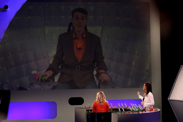 [contestant at the electric shocks console]